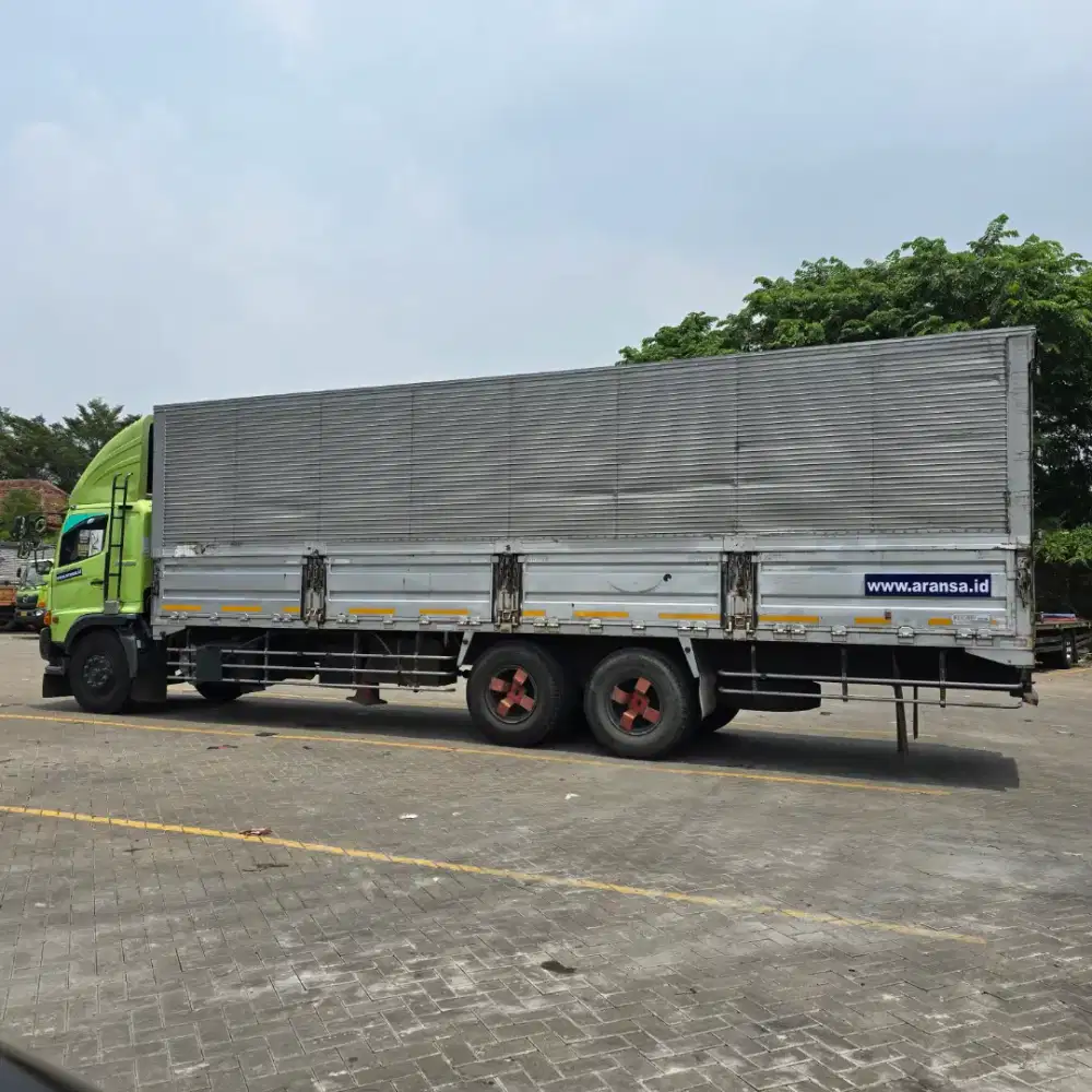 Tronton wingbox 9,5 meter harian bulanan tahunan