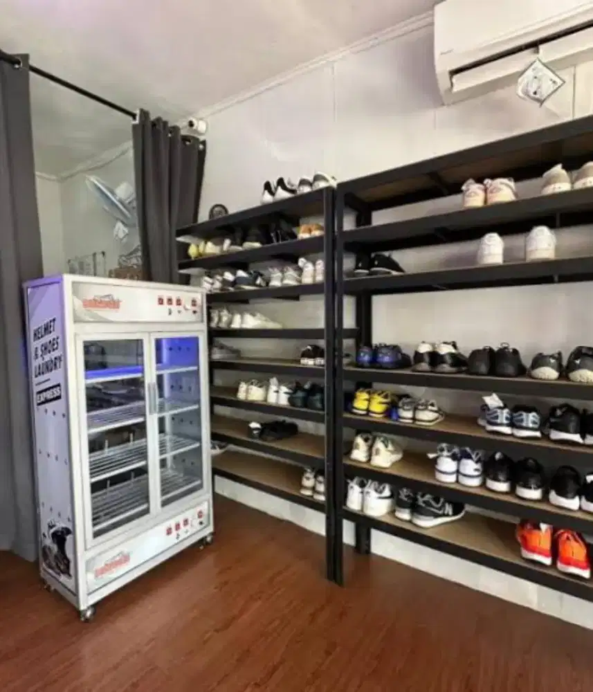Laundry sepatu dan helm Rawa buntu
