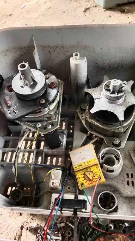 SERVIS MESIN CUCI