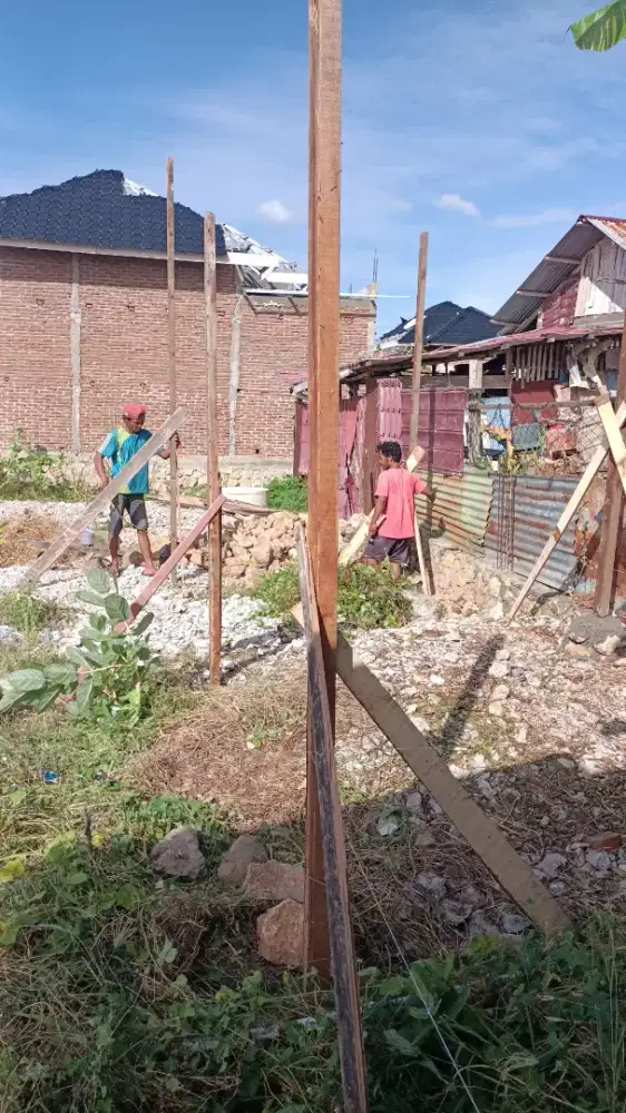 Tukang bangunan dari  Medan