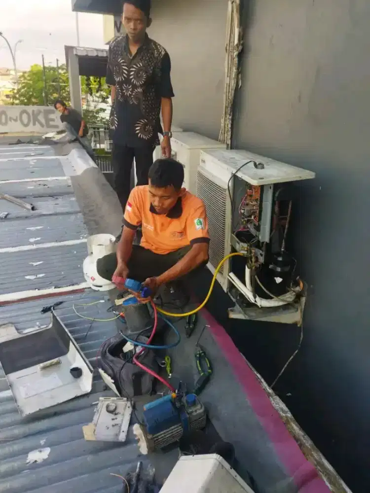 SERVICE AC BONGKAR PASANG AC