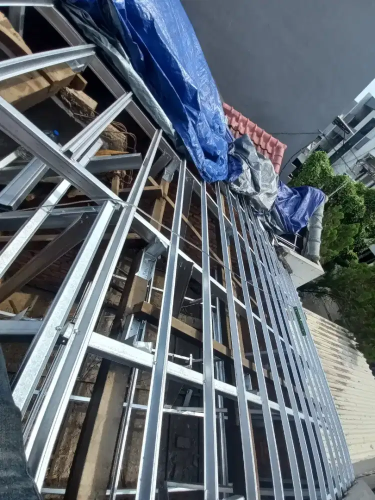 Tukang bangunan perbaikan atap bocor,dag,talang,kanopi,renopasi dll