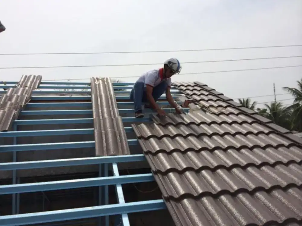 Tukang bangunan,renopasi,perbakan atap bocor,dag,talang,kanopi,dll