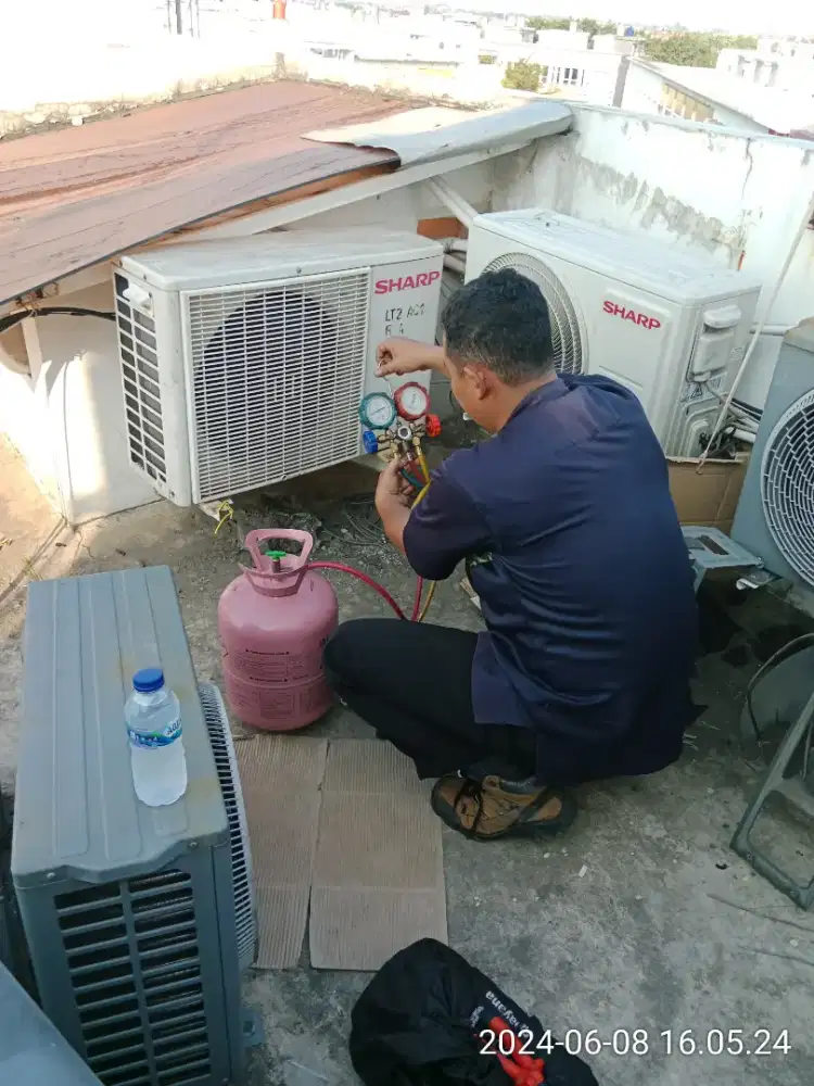 Service AC bongkar pasang AC kulkas dan mesin cuci