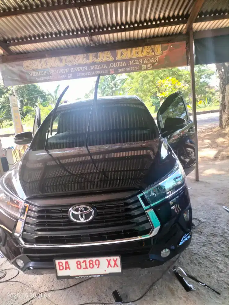 Pemasangan kaca film mobil dan audio mobil kota Padang