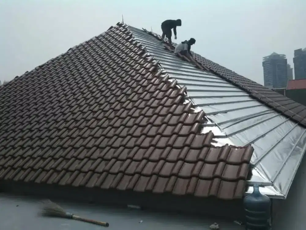 Bongkar pasang rangka atap bajaringan Genteng Keramik Morando
