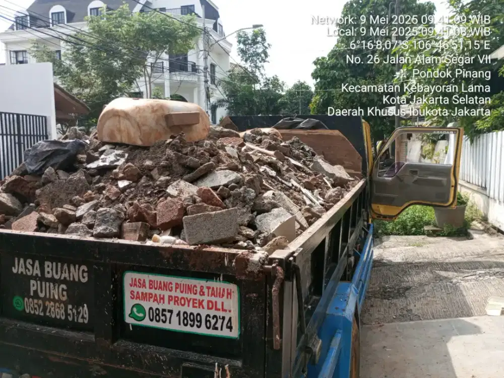 Jasa buang puing tanah