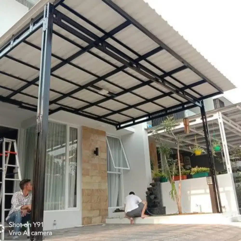 Kanopi bajaringan renoapsi atap rumah