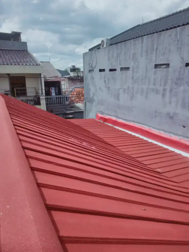 Perbaikan atap bocor dan renovasi