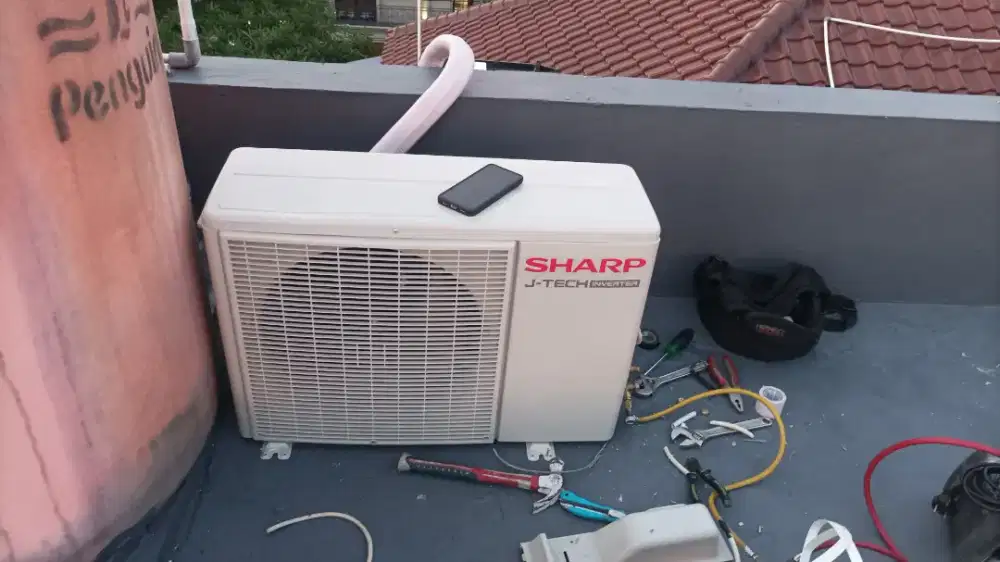 SERVIS AC BERGARANSI DINGIN