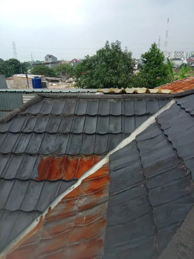 Perbaikan atap bocor dan pemasangan canopy
